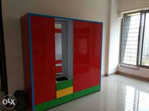 Red And Green Wooden Cabinet