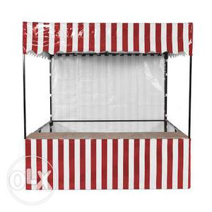 Red And White Striped Food Stand
