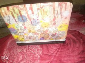 Red And Yellow Floral Print Laptop