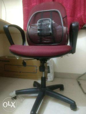Rotating wheel office chair with back support