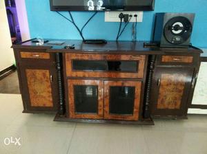 The TV table with 3 cupboards and 3 drawers with