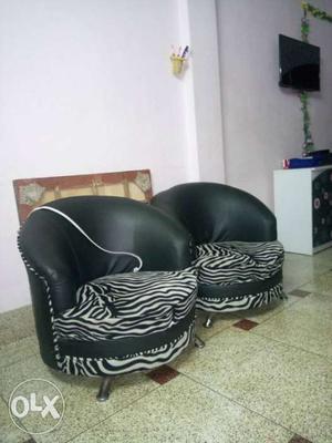 Two Black And White Cuddle Chairs