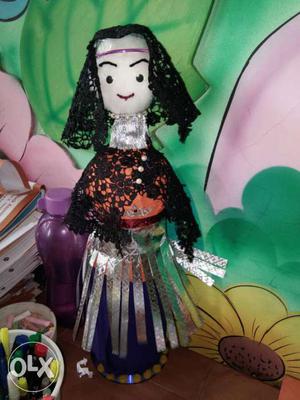 Woman Doll In Black Floral Dress