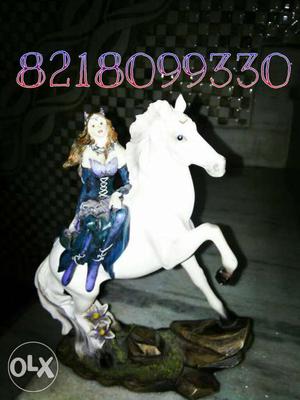 Woman In Dress Riding White Horse Figurine