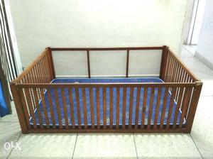 Wooden baby cot without mattress. Internal size:
