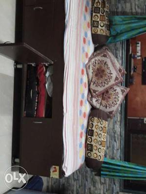 Wooden single bed 6×2... with mattress... on