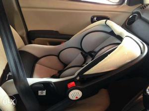 Baby's Grey And Black Car Seat