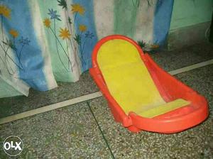 Baby's Yellow And Red Plastic Bathtub