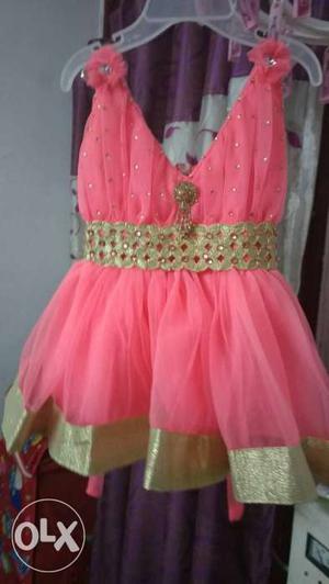 Beautiful Chery color party wear dress for baby