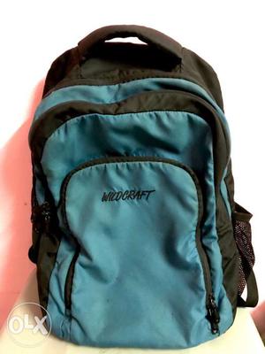 Black n blue Wildcraft Backpack in a reasonable price,