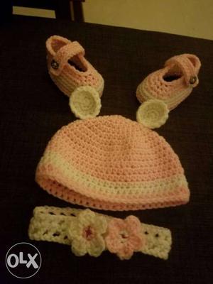 Crocheted white and-pink Bootees, Headband, And Cap Set