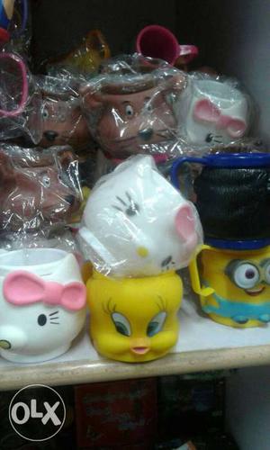 Two Hello Kitty Mugs; Tweety Mug; Minion Mug 1 pise rate 90