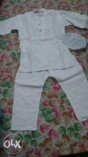 White kurta pyjama with cap for age upto 5years