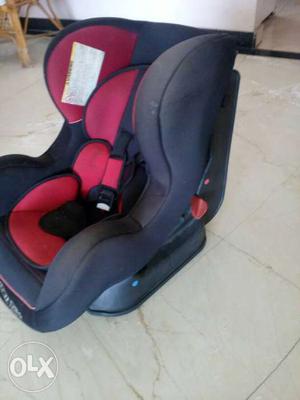 Baby's Black And Red Car Booster Seat