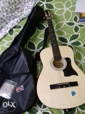 Beige Acoustic Guitar With Case