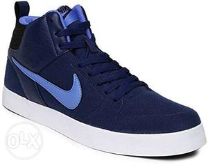 Blue And White Nike High Top Shoe