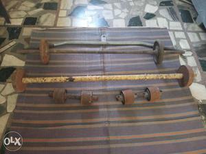 Brown Metal Barbell And Dumbbell