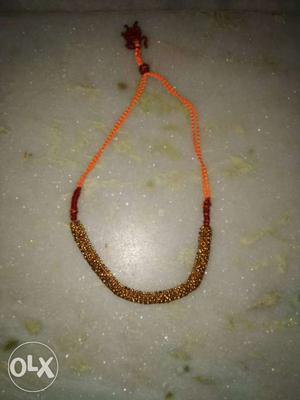 Orange And Gold-colored Necklace