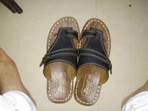 Pair Of Black-and-brown Leather One-toe Slide Sandals