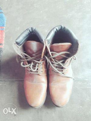 Pair Of Brown Leather Boots