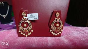 Pair Of Gold Pearl Dangling Earrings