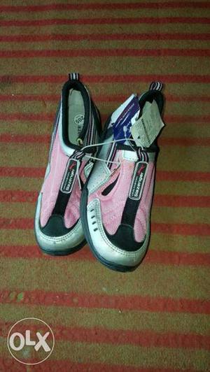Pair Of Pink, Black And Gray Slip On Shoes