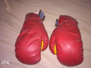 Pair Of Red Leather Boxing Gloves