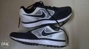 Pair Of White-black-and-gray Nike Running Shoes