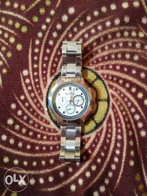 Round White Face Chronograph Watch With Silver Link