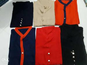 Six Black, Red, And Beige Tops