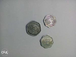 Three 10 And 20 Silver-colored Coins