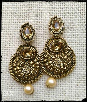 Two Gold-colored Drop Earrings
