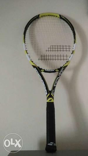 Yellow, White And Black Tennis Racket