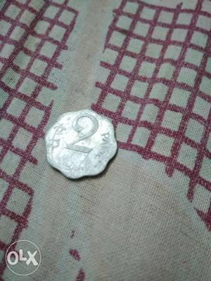 3 paisa coin made in  and it has national