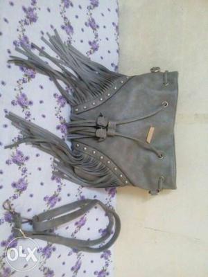A bag of fine leather in good condition. At an
