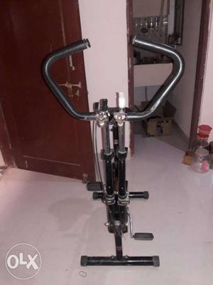 Black And Grey Stationary Bike in very good condition