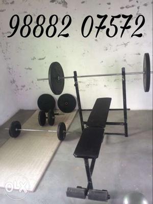 Black Bench Press With Barbells And Dumbell