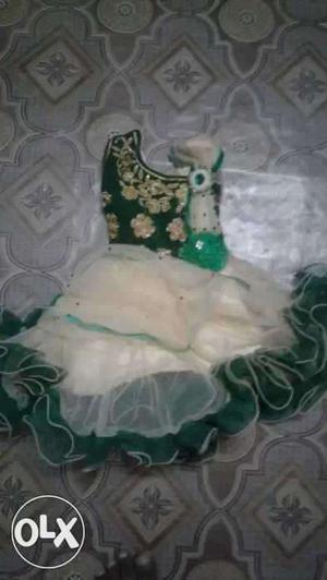 Cream & green frock 1year girl new brand no use