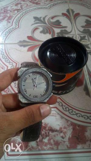 Fastrack metal body genuine leather watch