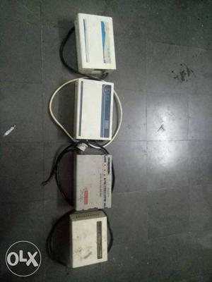 Four White Electronic Devices