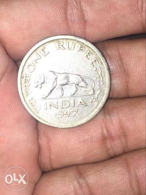 One rupees silver round coin 