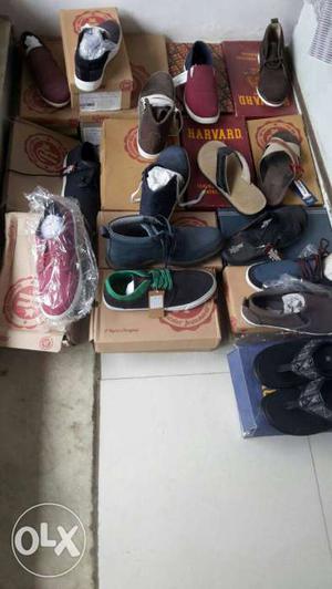 Pair Of Footwears With Boxes