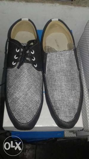 Pair Of Gray Boaters Shoes