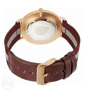 Round Gold Watch With Brown Strap