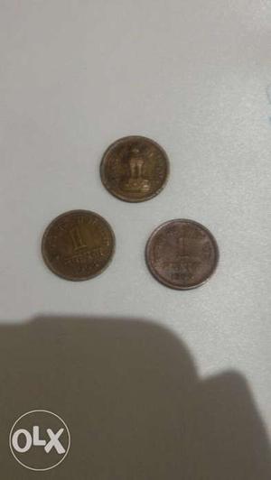 Round Gold-colored Coins. years old coin