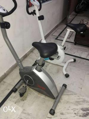 Two Gray And White Stationary Bikes