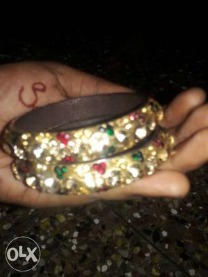 Two Green And Red Embellish Gold Bangles