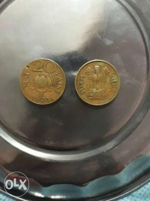 Two Round Gold-colored Indian Paise Coins