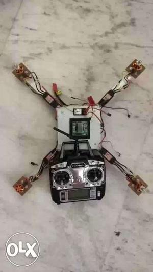 White And Black Quadcopter Drone With RC