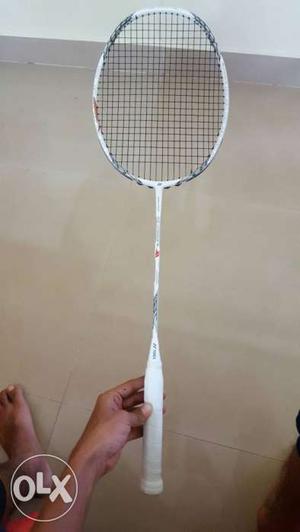 White And Gray Badminton Racket